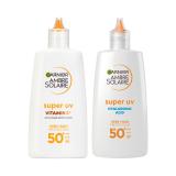 Set Opalovací přípravek na obličej Garnier Ambre Solaire Super UV Hyaluronic Acid SPF50+ + Opalovací přípravek na obličej Garnier Ambre Solaire Super UV Vitamin C SPF50+